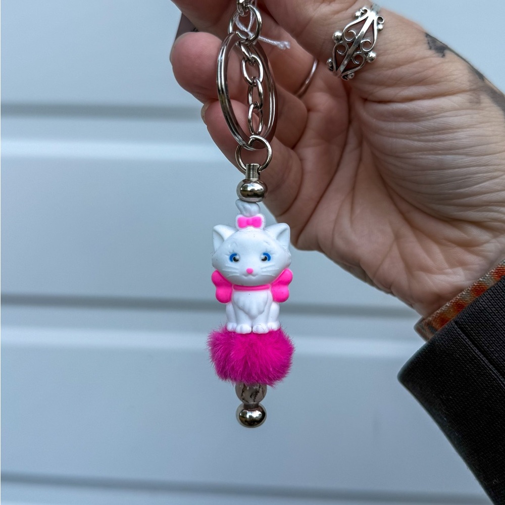 Cute Marie Keychain with Fuzzy Pink Accents